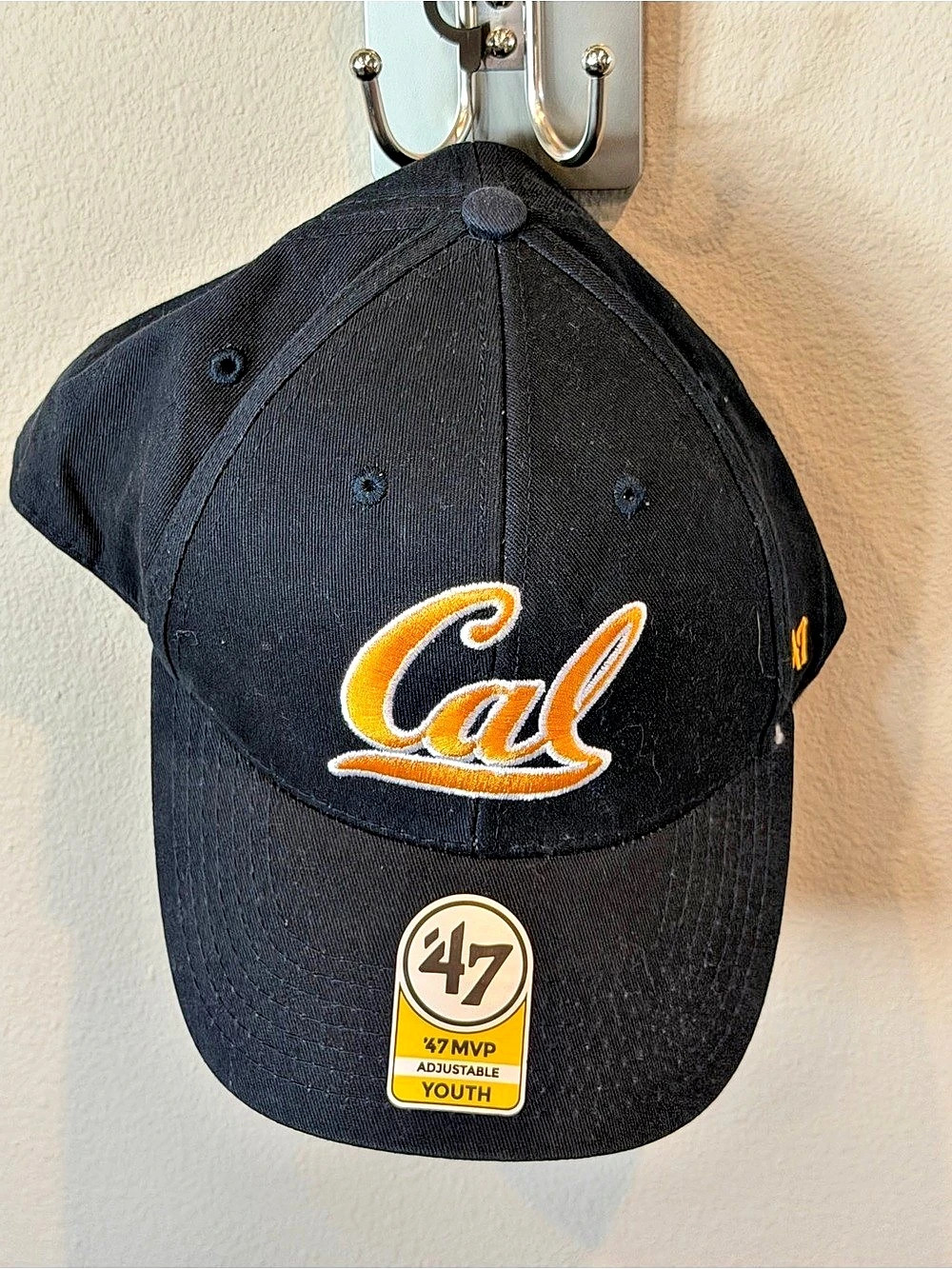 47 Cal Black Adjustable Cap NWT Youth size.